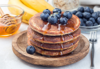 Banana oat pancakes with honey and blueberry
