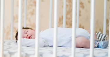 Baby sleeping in a crib